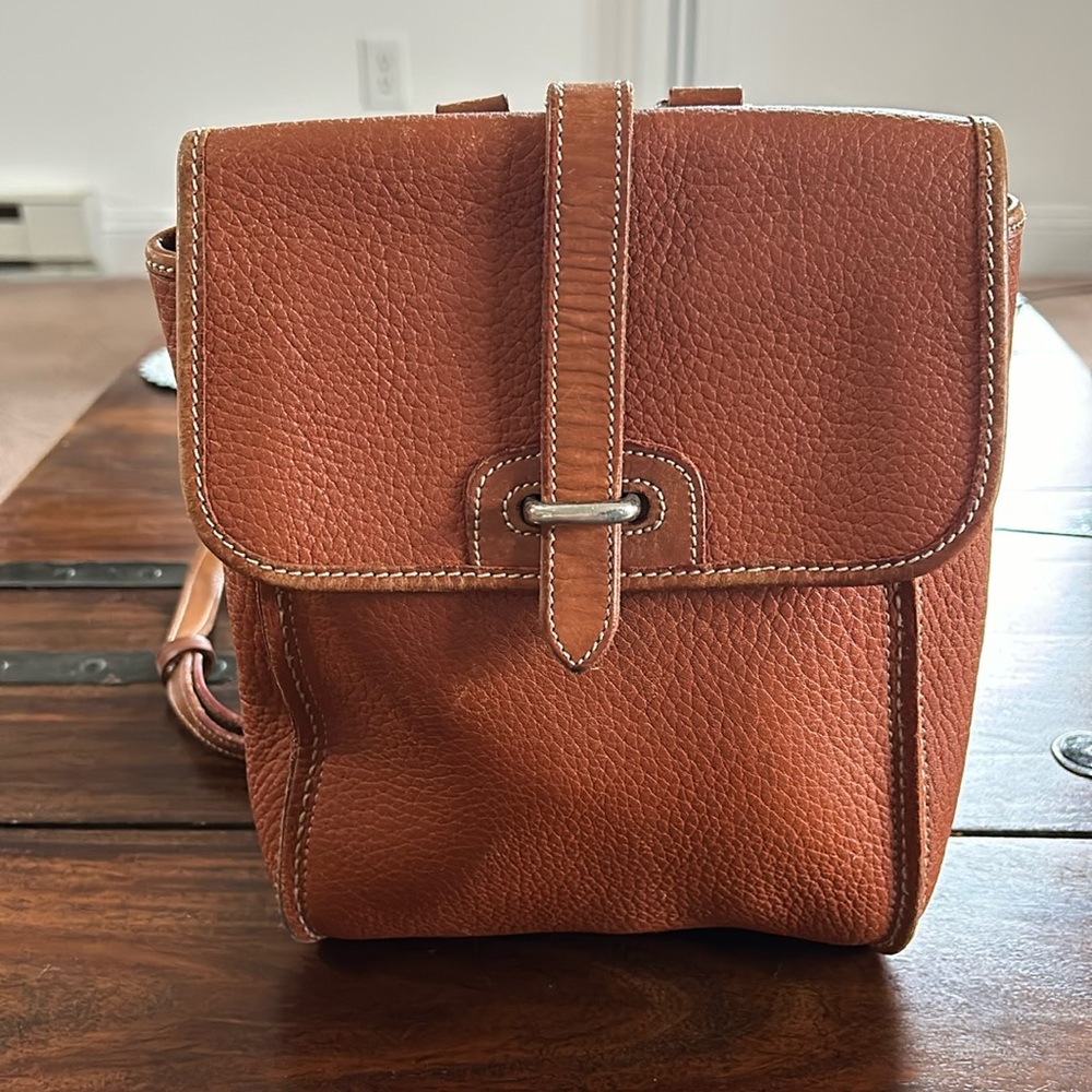 Dooney & Bourke vintage pebble leather double strap backpack.